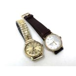 A gent's gold plated Rotary GT wristwatch on expanding strap, together with an Avia watch.