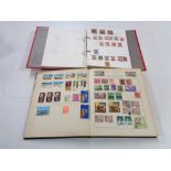 Two albums of stamps - World stamps and India.