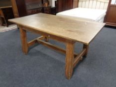 A 20th century oak refectory dining table