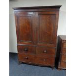 A Victorian mahogany linen press, fitted five trays and three drawers beneath.