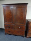 A Victorian mahogany linen press, fitted five trays and three drawers beneath.