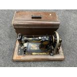 A vintage Jones cased sewing machine.