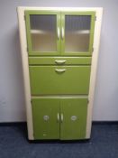 A mid 20th century painted kitchen cabinet