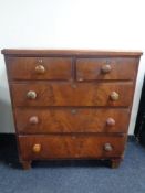 A 19th century stained pine five drawer chest.