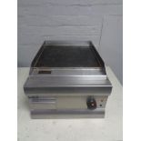 A Lincat stainless steel commercial griddle.