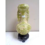 A carved polished stone Chinese vase, height 27.5 cm.