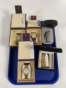 A tray containing five boxed ladies and gents wristwatches to include Ingersol,