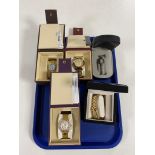 A tray containing five boxed ladies and gents wristwatches to include Ingersol,