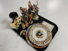 A tray of continental figurines, Royal Doulton miniature character jug Long John Silver,