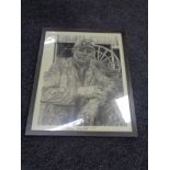 A framed monochrome print of Ronnie Campbell MP working as a miner.