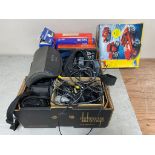A box containing dictionaries, Sony video camera, accessories etc.