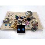 A collection of jewellery to include brooches, earrings, Sterling silver boat brooch etc.