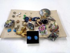 A collection of jewellery to include brooches, earrings, Sterling silver boat brooch etc.