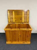 A 20th century pine panelled blanket chest