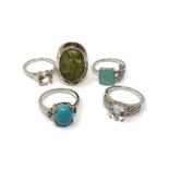 Five silver gem set dress rings.