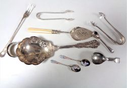 A small collection of plated cutlery together with a pair of continental silver teaspoons and a