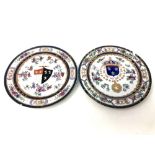 A pair of 19th century armorial cabinet plates, width 24 cm.