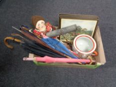 A box containing vintage parasols and riding crops, hunting prints in Hogarth frames,