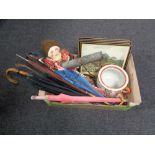 A box containing vintage parasols and riding crops, hunting prints in Hogarth frames,