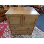 A Georgian mahogany commode chest