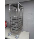 A stainless steel commercial Bain Marie trolley with Bain Marie trays, height 137 cm.