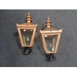 A pair of reproduction lanterns, height 62 cm.