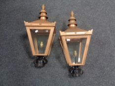 A pair of reproduction lanterns, height 62 cm.