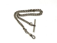 An antique silver Albert chain, 35g.