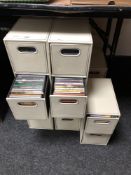 14 cream faux leather two drawer storage chests containing a large quantity of assorted CDs.