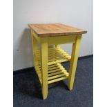 A pine butcher's block trolley on painted base