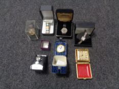 A tray containing a quantity of boxed wristwatches,