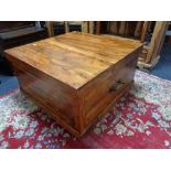 A sheesham wood storage coffee table