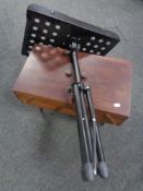 A 20th century concertina sewing box together with an adjustable music stand.