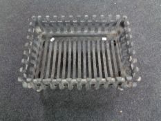 A cast iron fire grate