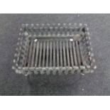 A cast iron fire grate