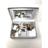 A box of costume jewellery, brooches, necklaces etc.