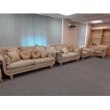 A four piece contemporary wood framed and bergere lounge suite comprising of scroll arm three