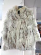 An Arctic fox fur coat.