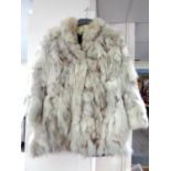 An Arctic fox fur coat.