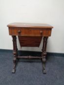 A 19th century mahogany work table fitted a drawer