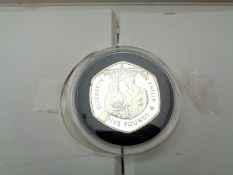 An Alderney silver proof £5 coin to commemorative the 1947 - 2007 Diamond Wedding Anniversary