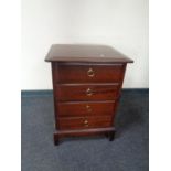 A Stag Minstrel four drawer bedside chest