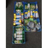 Seven plastic crates containing spray paints, rust proofers, twist wire door springs etc.