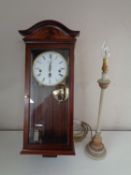 Comitti of London eight day wall clock and a contemporary table lamp