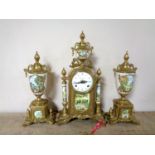 A three piece Imperial clock garniture set with Franz Hermle movement.