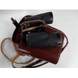 Leather cased Carl Zeiss Jenoptem 8 x 50 W field glasses