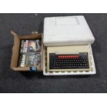 An Acorn BBC micro computer system in original polystyrene packaging together with a box containing