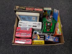 A box containing miscellaneous to include Shrek Monopoly, Waddingtons jigsaws, digital TV receiver,