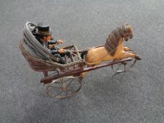 A wooden horse drawn cart.