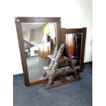 Two framed wall mirrors, one with brass mounts, together with a carved triangular wall shelf.